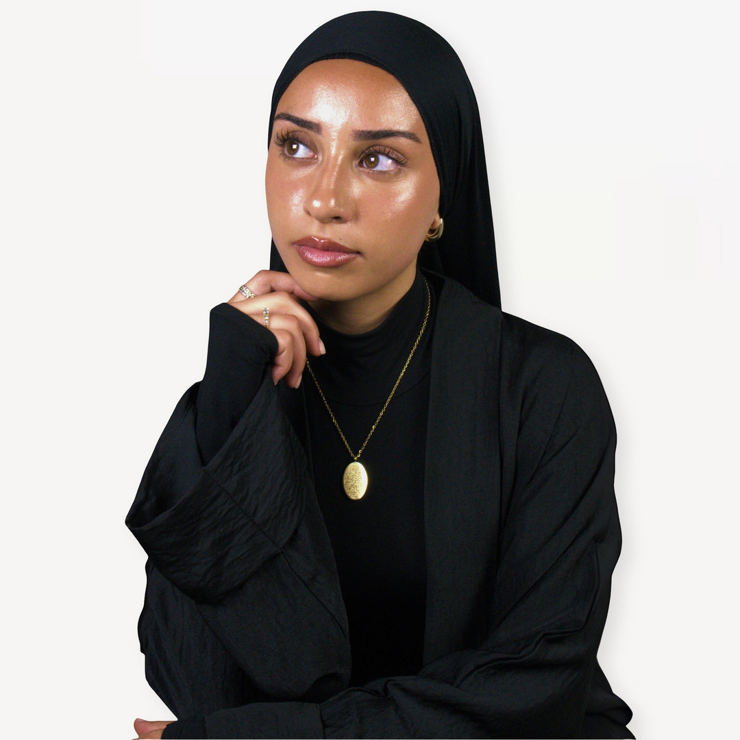 قلادة مزينة بآية الكرسي