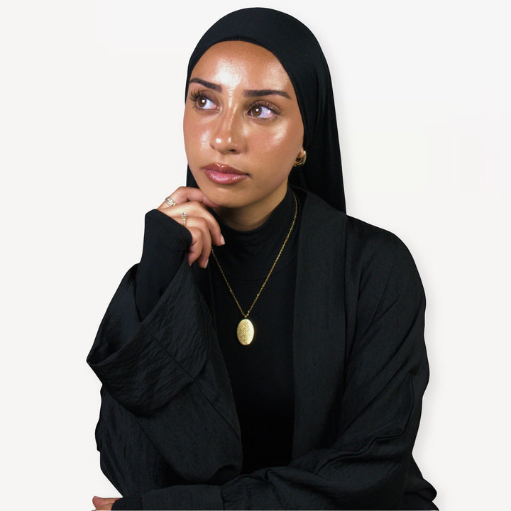 قلادة مزينة بآية الكرسي